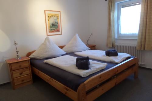Borkum Ferienhaus Stamm - Schlafzimmer 1/EG