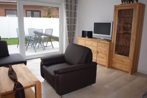 Borkum Ferienwohnung Dünenparadies - Wohnzimmer