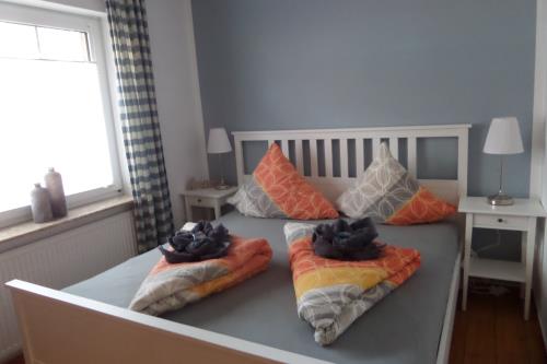 Borkum Ferienwohnung Gartmann - Schlafzimmer