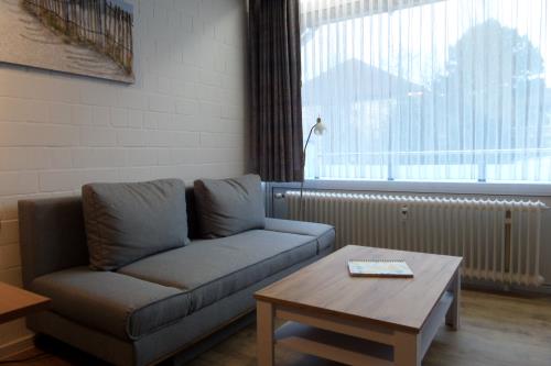 Borkum Ferienwohnung Trautes Heim - Wohnbereich/Schlafcouch