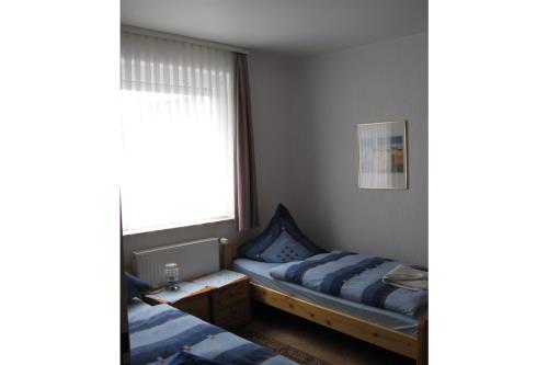 Borkum Ferienwohnung Haus Münsterland Whg.2/EG - Schlafzimmer