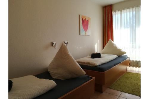 Borkum Ferienwohnung Möwennest II, Wohnung33 - Schlafzimmer