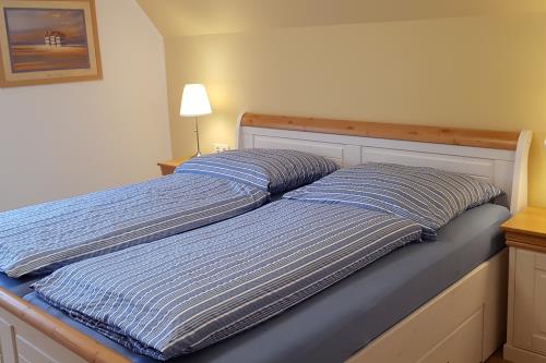 Borkum Ferienhaus Zum Reitstall - Schlafzimmer 1