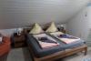 Borkum Ferienwohnung im Haus Jan Granat - Schlafzimmer mit Doppelbett 2 x 2m